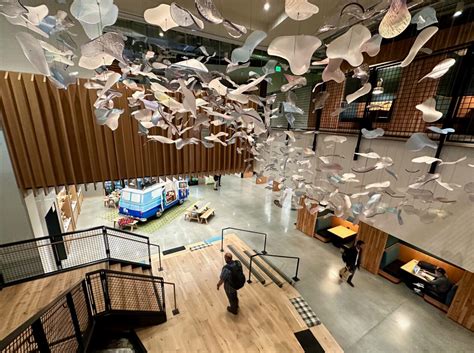 Amazon restarting construction on 22 unfinished floors inside Bellevue .